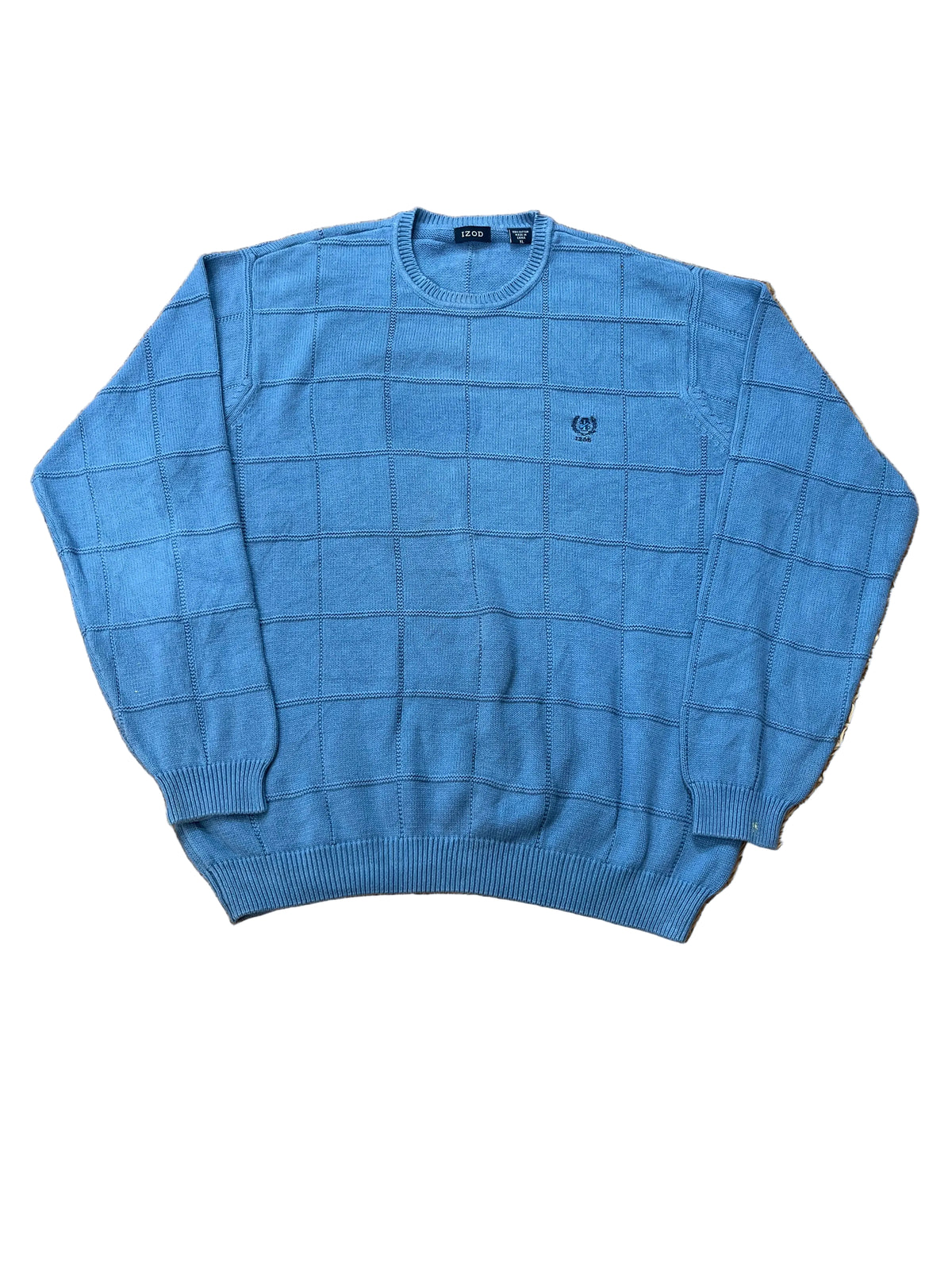 A blue long-sleeve knit sweater with a subtle grid pattern and a small embroidered crest on the left chest, 