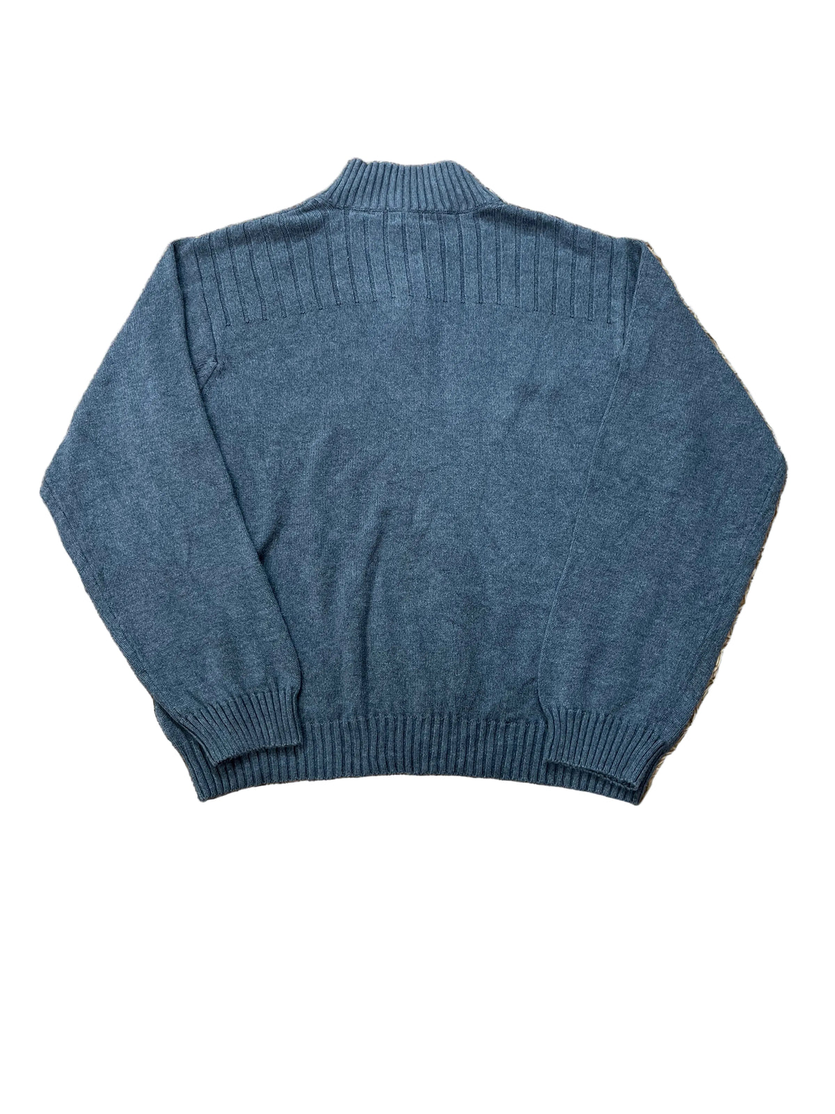 A dark slate blue knit sweater with a mock neck, ribbed shoulders, and ribbed cuffs and hem,