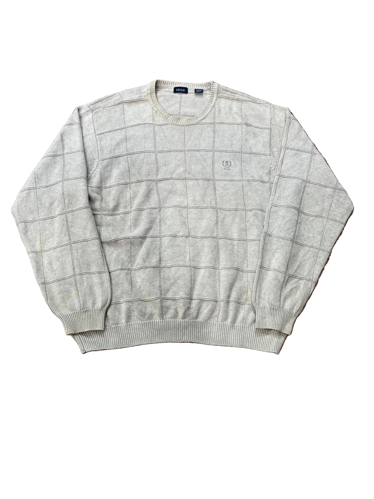 A light beige crewneck sweater with a subtle windowpane grid pattern, . The brand label inside the collar reads 'Burberrys'.