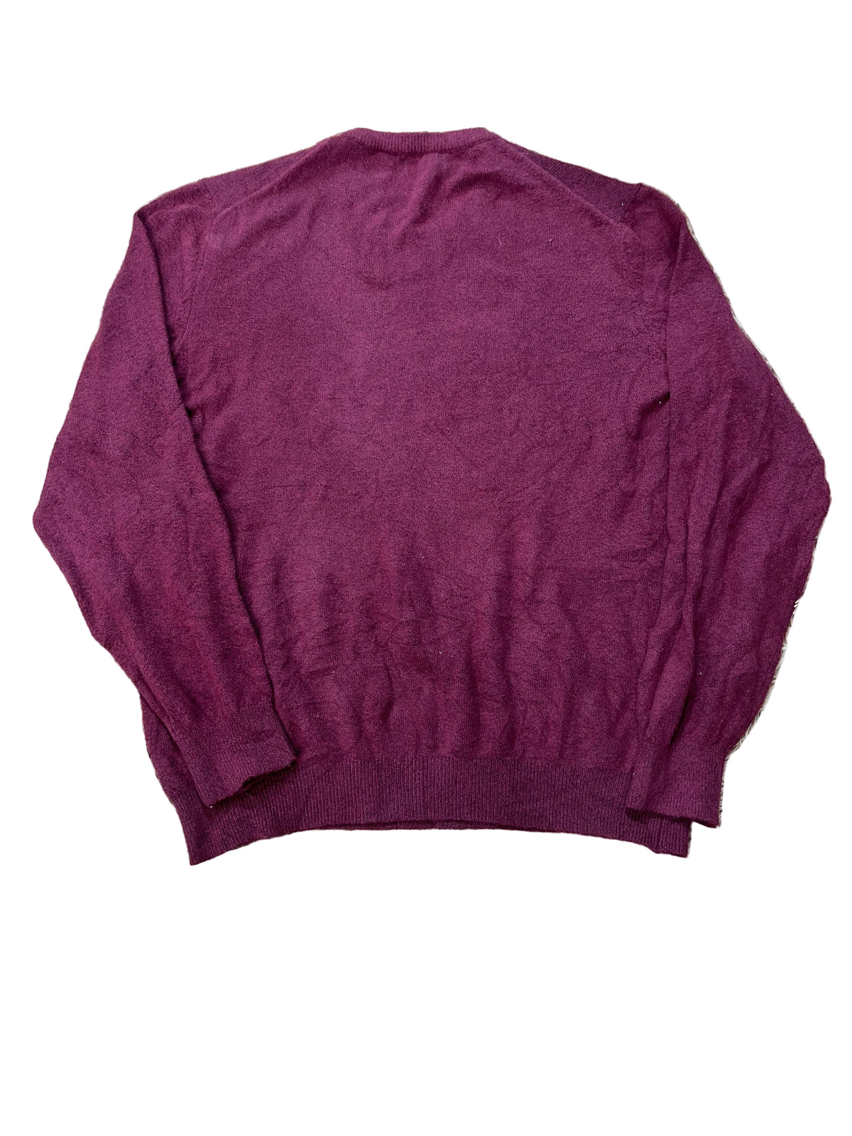 A maroon knit sweater on a white plain backround 