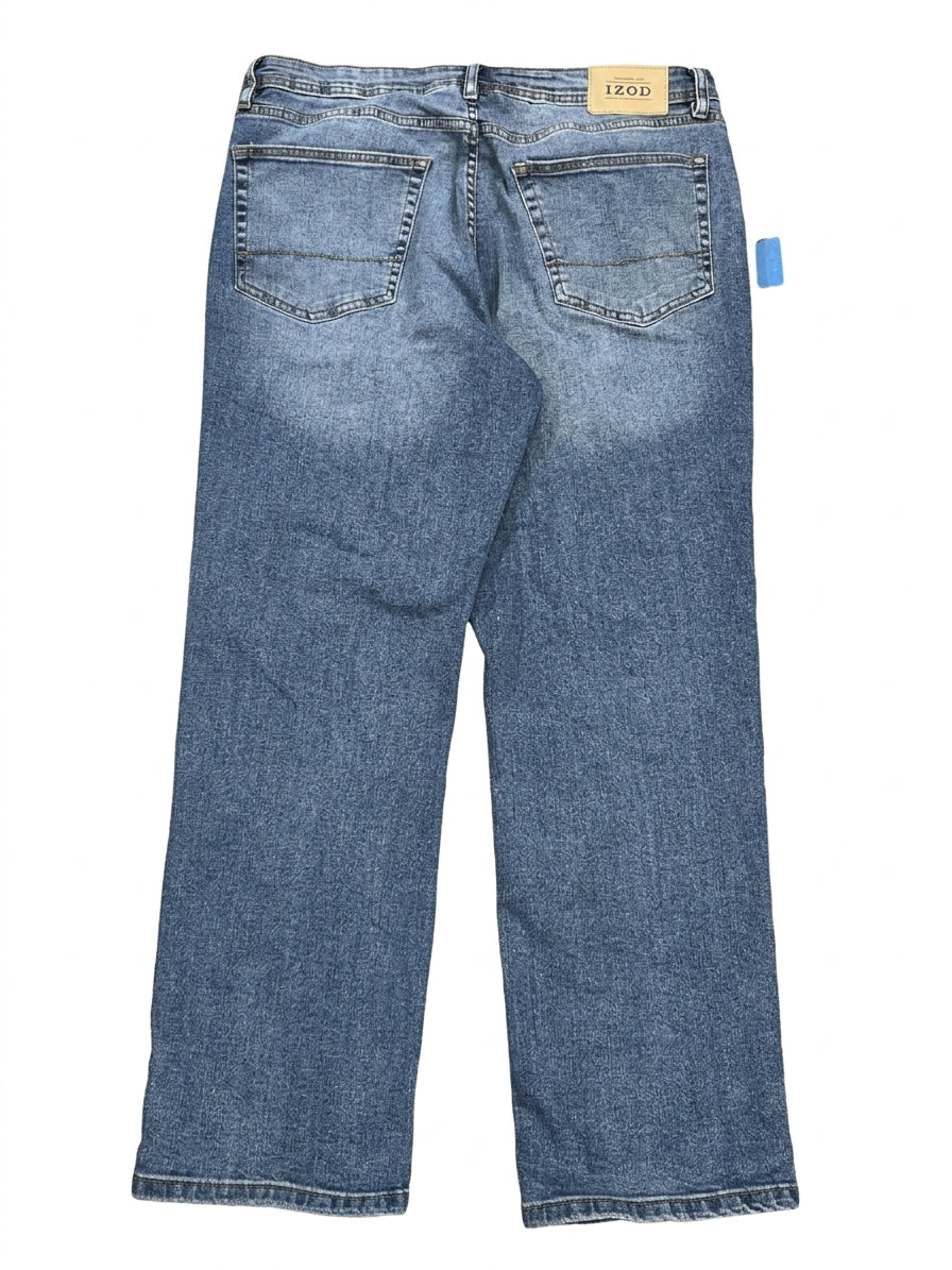 Back view of a pair of blue denim jeans with a faded wash, featuring two back pockets and a tan brand label at the waistband.
