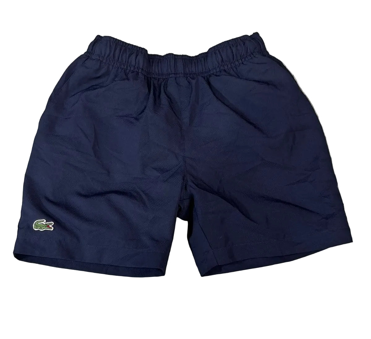 Navy blue Lacoste shorts with an elastic waistband and the signature green crocodile logo on the left leg
