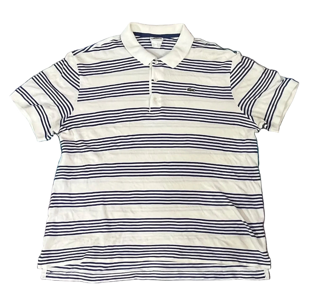 A Lacoste short-sleeve polo shirt with navy blue horizontal stripes on a white base,