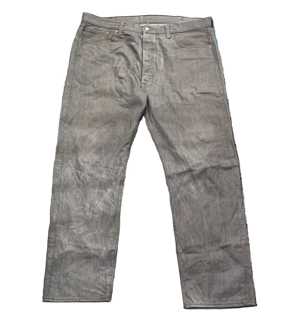 A pair of gray slim-fit jeans on a white plain background 