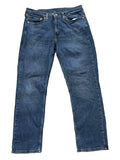 A pair of dark blue denim jeans