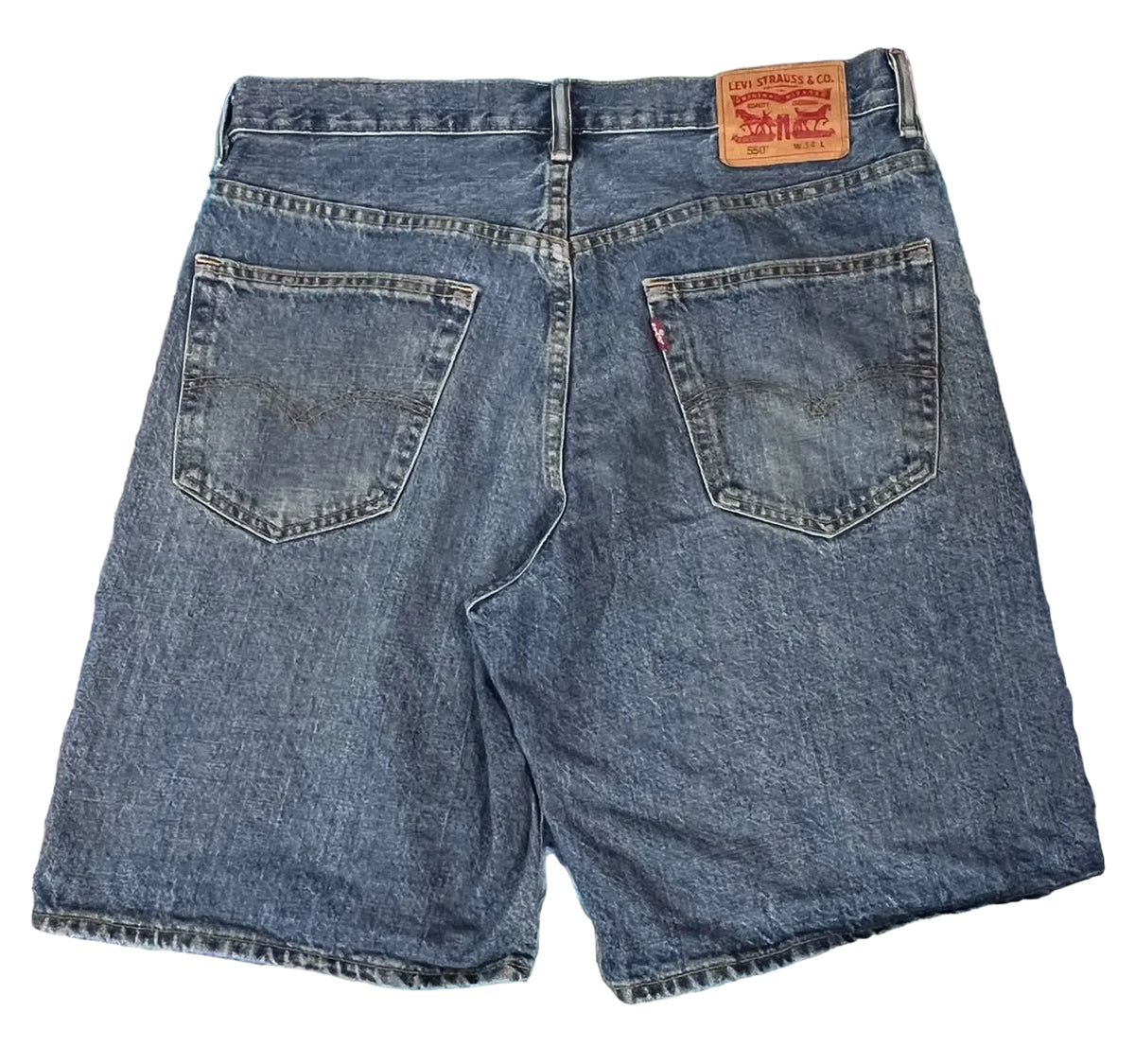 A pair of blue Levi's denim shorts shown from the back,. The iconic brown leather patch with red text is visible at the back waistband.