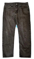 LEVI'S 502 MEN DENIM JEANS ON A WHITE PLAIN BACKGROUND 