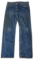 LEVI'S 505 MEN DENIM JEANS ON A WHITE PLAIN BACKGROUND  