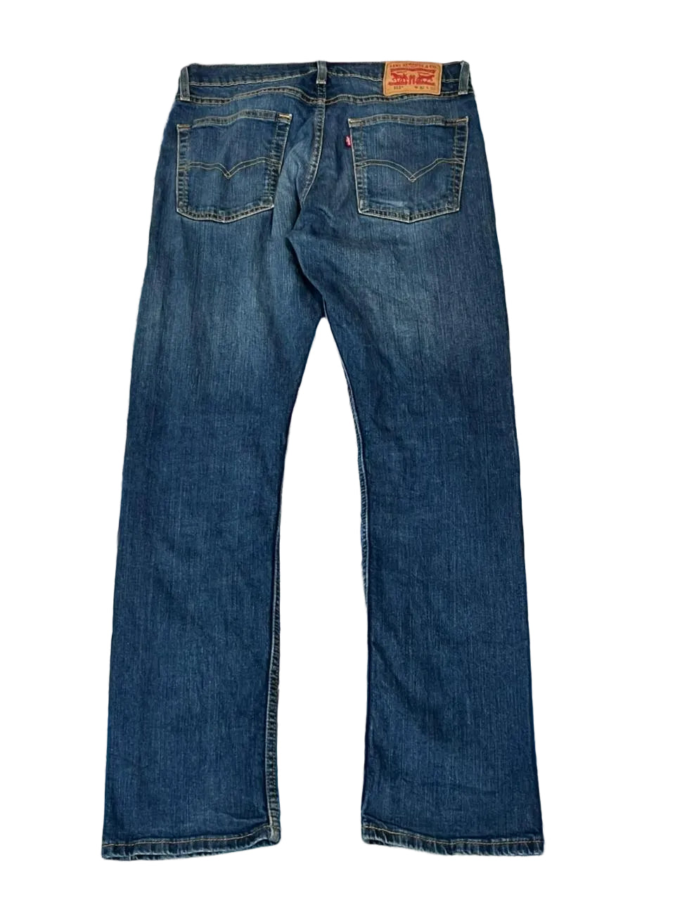 LEVI'S 513 MEN DENIM JEANS ON A WHITE PLAIN BACKGROUND 