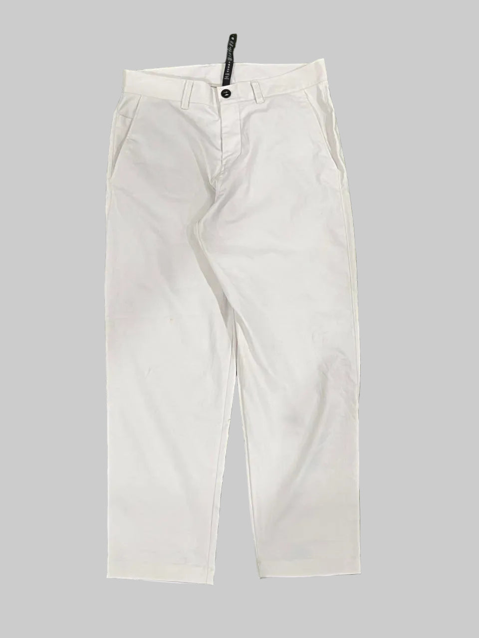 LU LU LEMON white pants on a plain white background