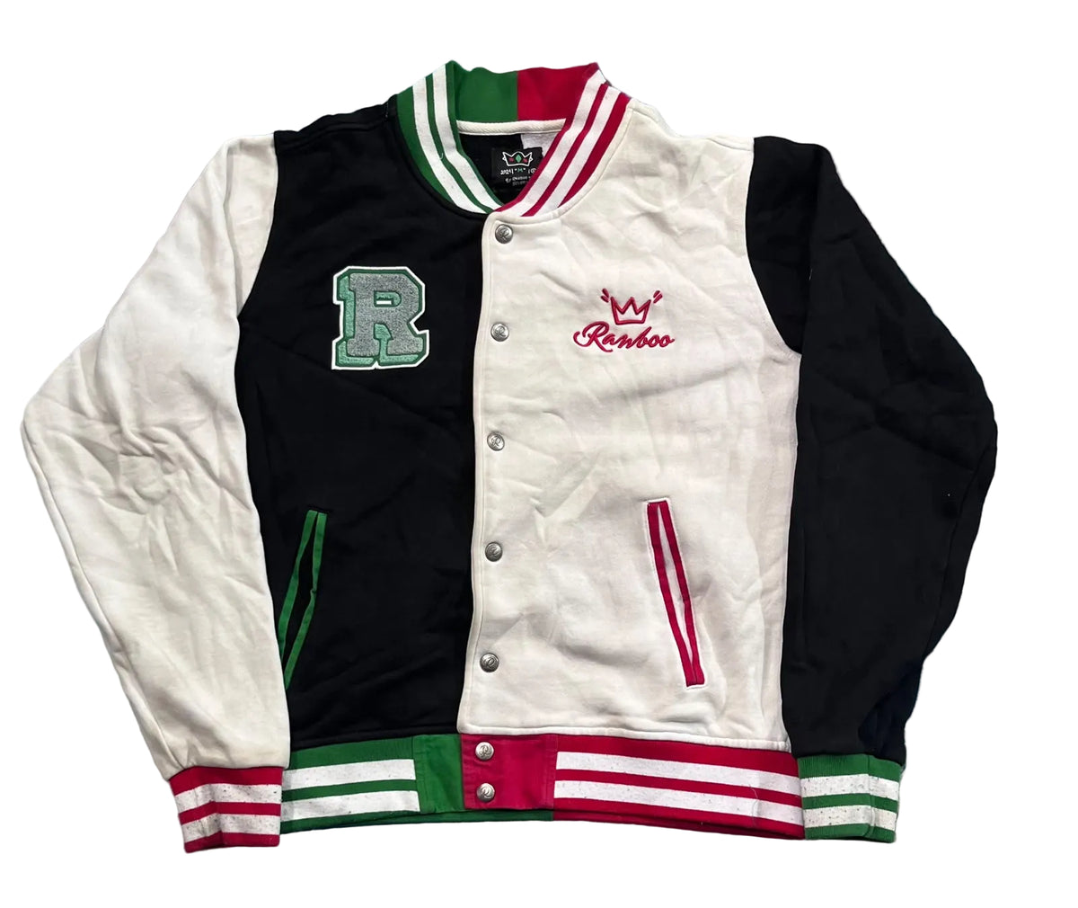 A vintage-style varsity jacket . The jacket features a split design with a black left panel and a white right panel, accented with green and red stripes on the collar, cuffs, and hem.