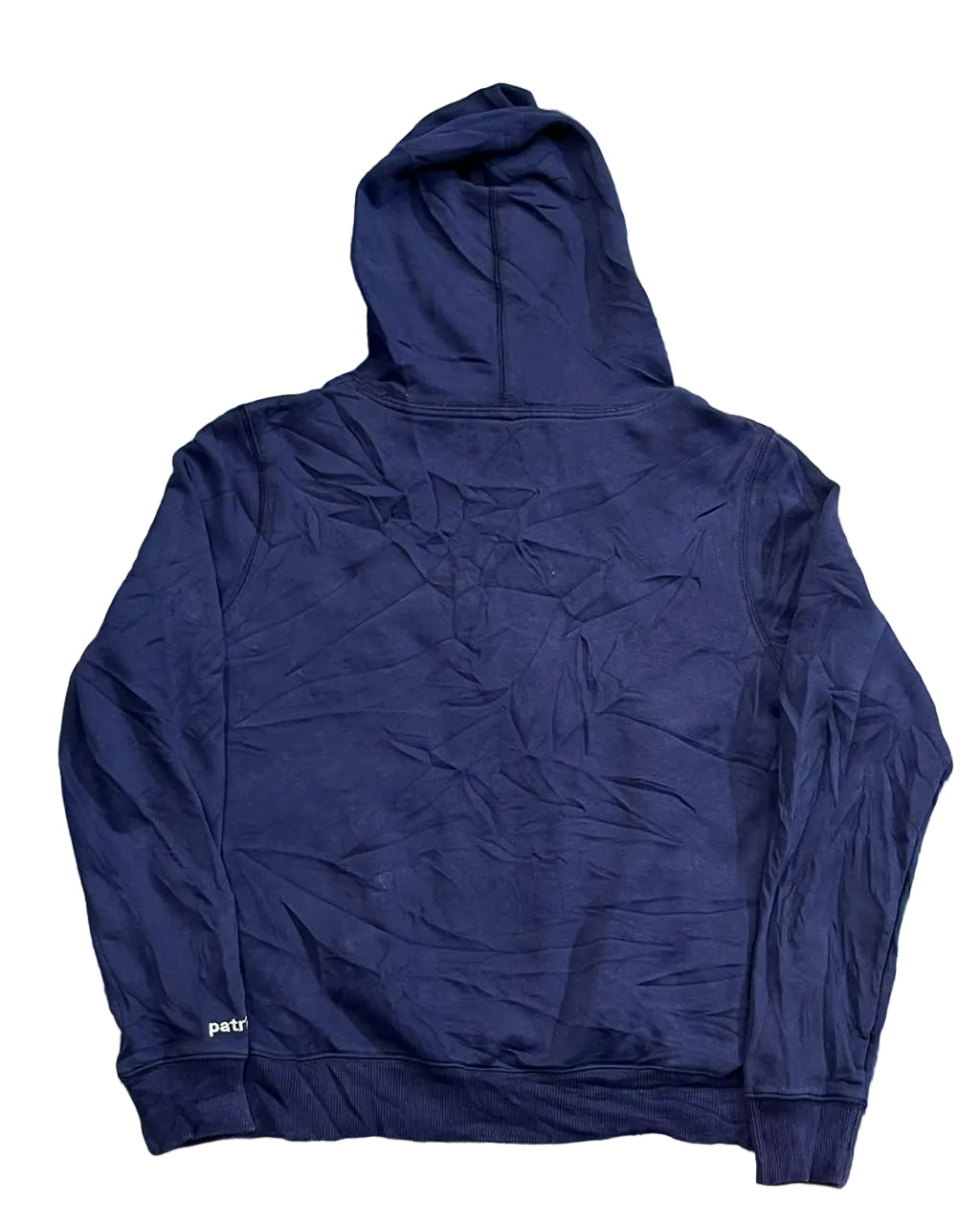 A navy blue hooded sweatshirt The back of the hoodie is wrinkled, and a small white 'pat' logo is visible on the lower left cuff.