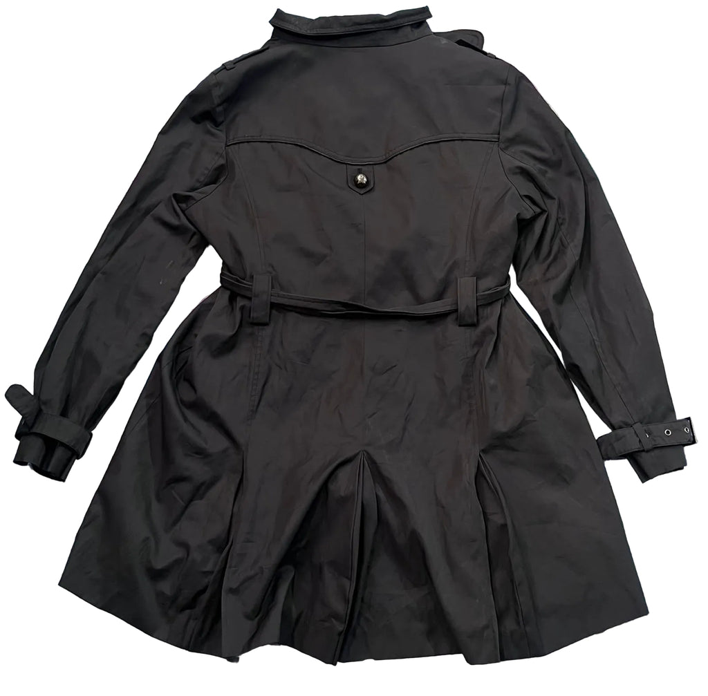 A black trench coat The back of the coat is shown, featuring a collar, a single button closure, a waist belt with loops, and buttoned cuffs.