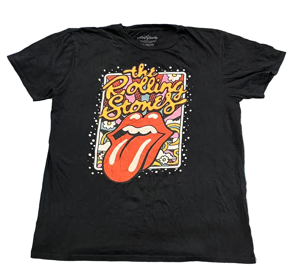 A black short-sleeve t-shirt featuring a colorful graphic of The Rolling Stones' lips and tongue logo on the front