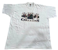 A white short-sleeve graphic t-shirt  The front of the shirt features a 'New Orleans' graphic with a central portrait of Louis Armstrong.
