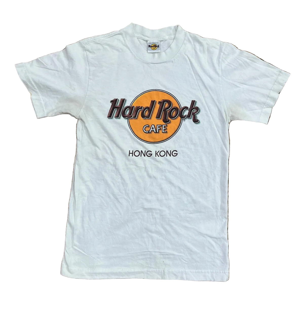 A white short-sleeve t-shirt with a Hard Rock Cafe Hong Kong graphic printed on the chest, 
