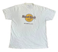 A white short-sleeve t-shirt with a 'Hard Rock CAFE ATLANTIC CITY' graphic on the front,