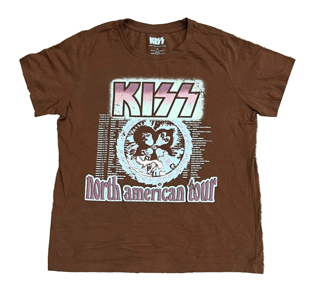 A brown short-sleeve KISS 'North American Tour' graphic t-shirt . The shirt features the band's logo in pink and white above a circular graphic, with 'North American Tour' printed below in pink and white.