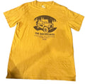 A yellow short-sleeve graphic t-shirt  The shirt features a black graphic of a vintage jeep in a forest with the text 'THE BACKROADS EXPLORE OUTDOORS 1986'.
