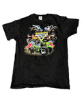 A black short-sleeve graphic t-shirt featuring a Monster Jam truck rally print