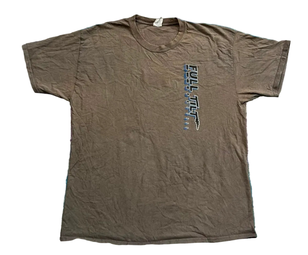 A brown short-sleeve t-shirt with a vertical graphic on the left chest reading 'FULL MGS' in blue and white,  A person's bare feet are visible at the bottom edge.