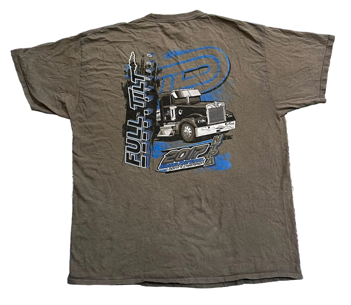 A brown short-sleeve graphic t-shirt . The back of the shirt features a large graphic print of a semi-truck, a stylized letter 'P', and the text 'FULL TIME 2012' and 'Pepsi Racing'.