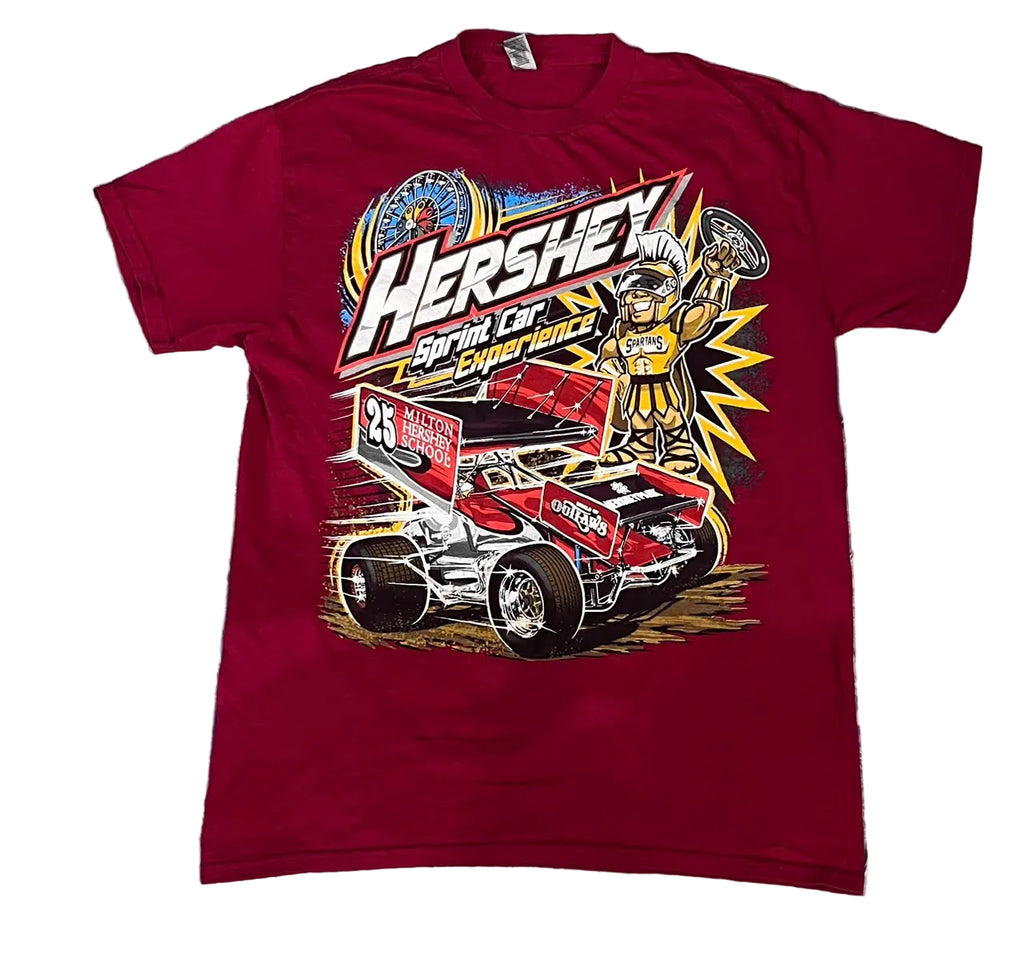 A vintage red short-sleeve t-shirt featuring a large graphic of a Hershey's Sprint Car race car and a cartoon character
