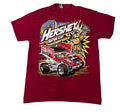 A vintage red short-sleeve t-shirt featuring a large graphic of a Hershey's Sprint Car race car and a cartoon character