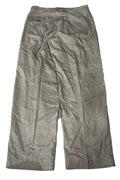 A pair of light brown cropped trousers with a wrinkled texture,  on the white background