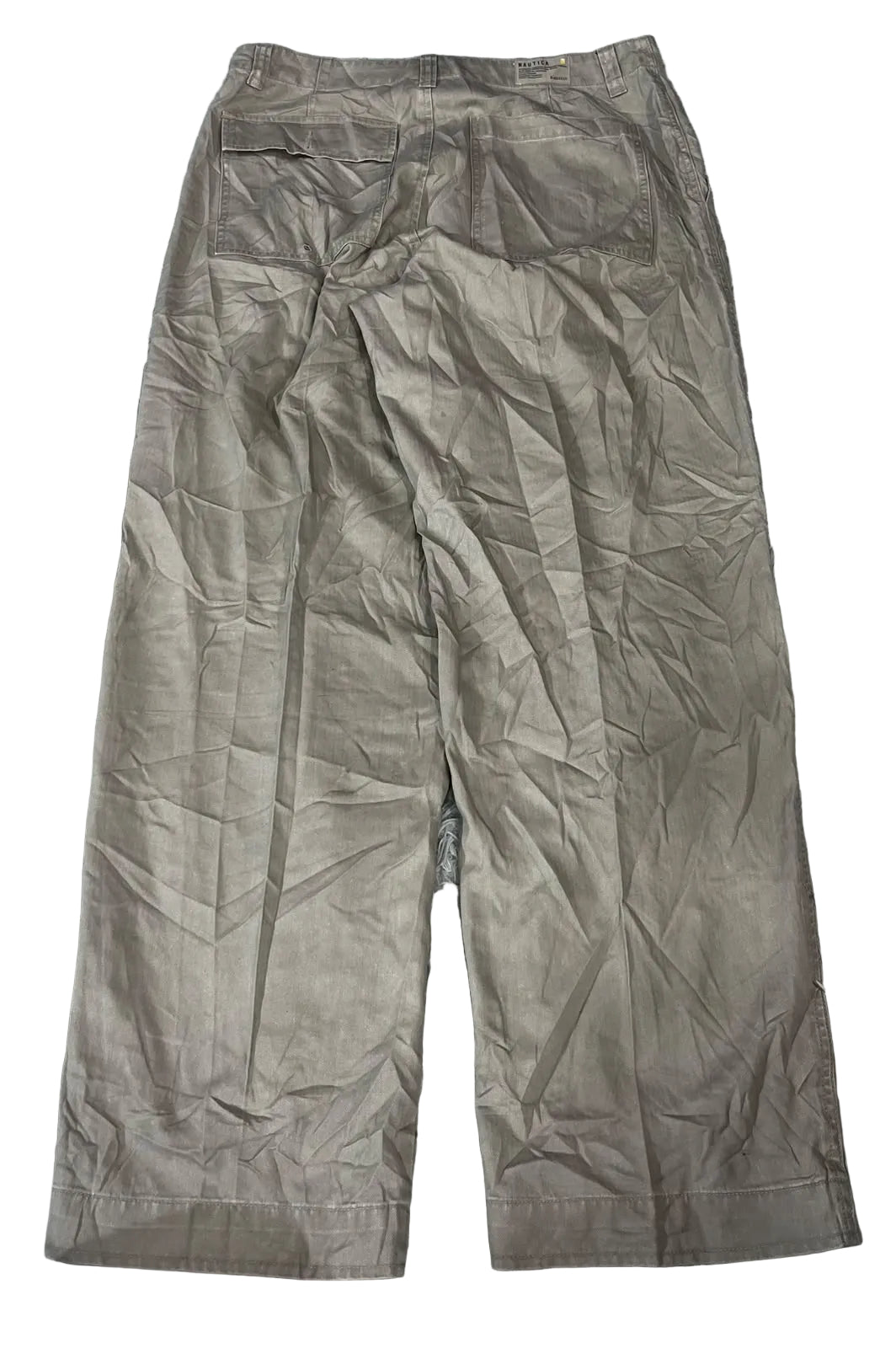 A pair of light brown cropped trousers with a wrinkled texture,  on the white background