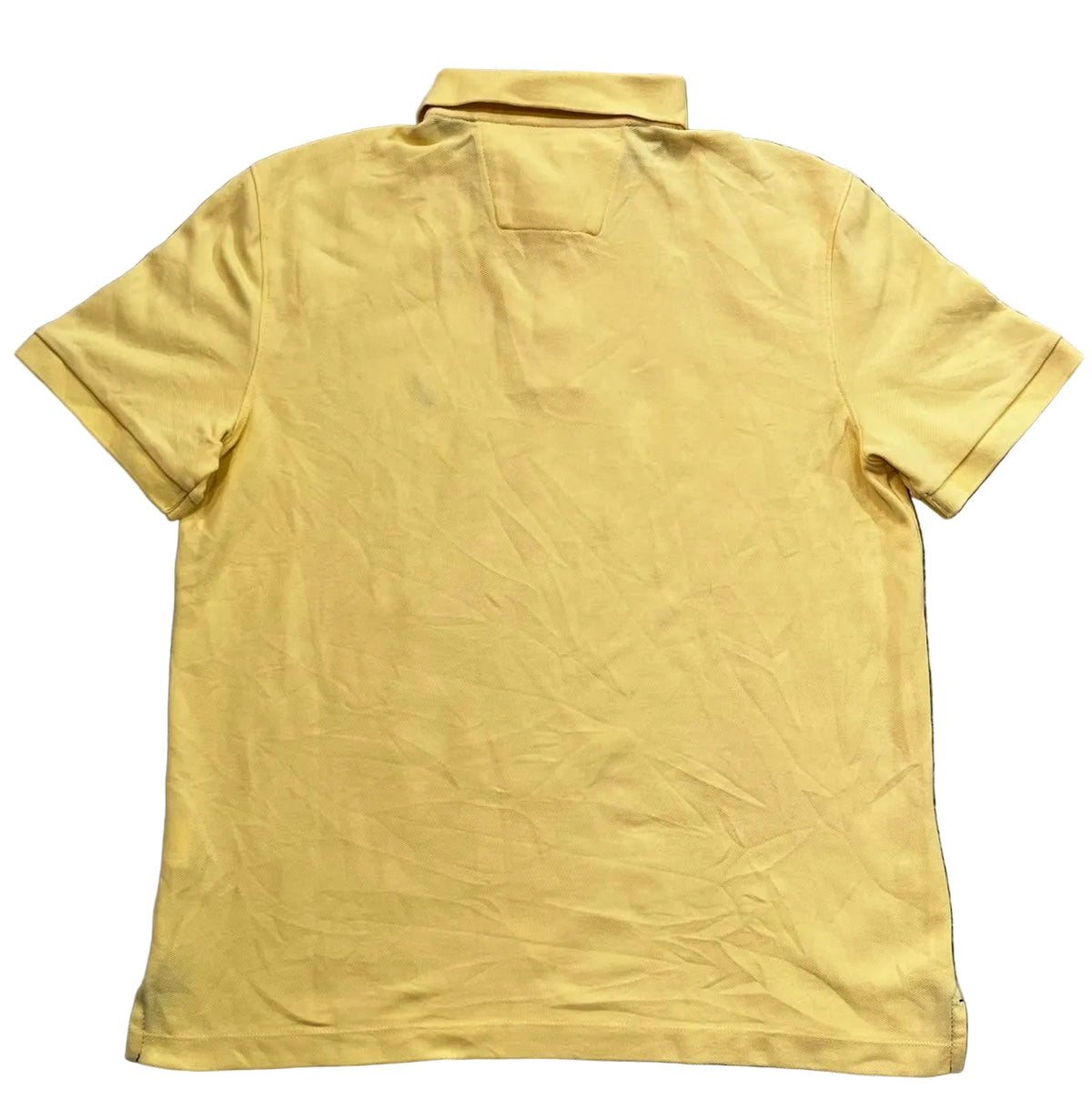 A yellow short-sleeve polo shirt , showing the back view.