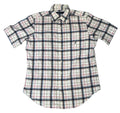 A short-sleeve button-up plaid shirt The shirt has a white base with navy and red plaid lines, and a small embroidered logo on the chest pocket.