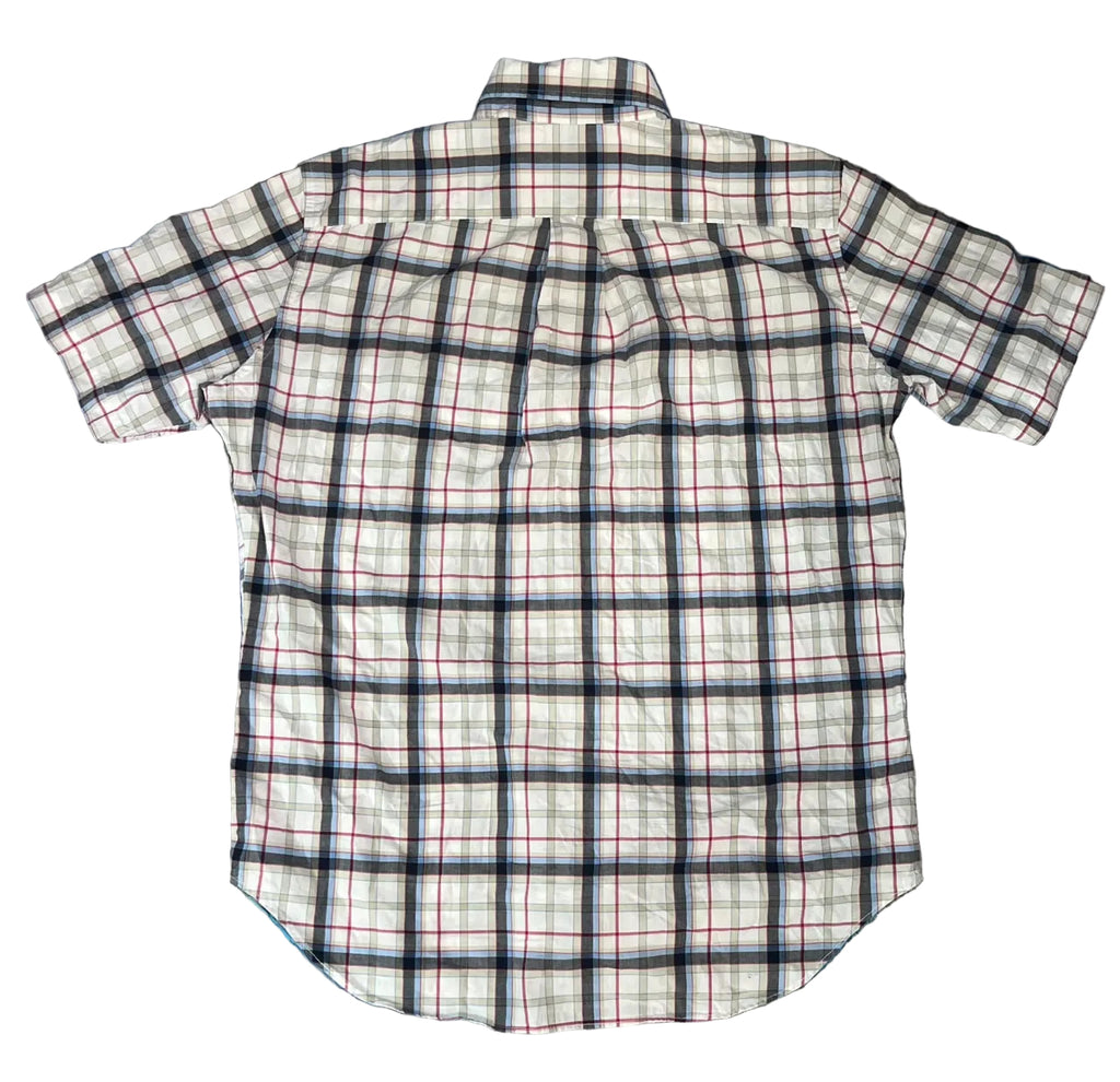 A short-sleeve plaid button-up shirt  The shirt features a white base with a black and red grid plaid pattern.