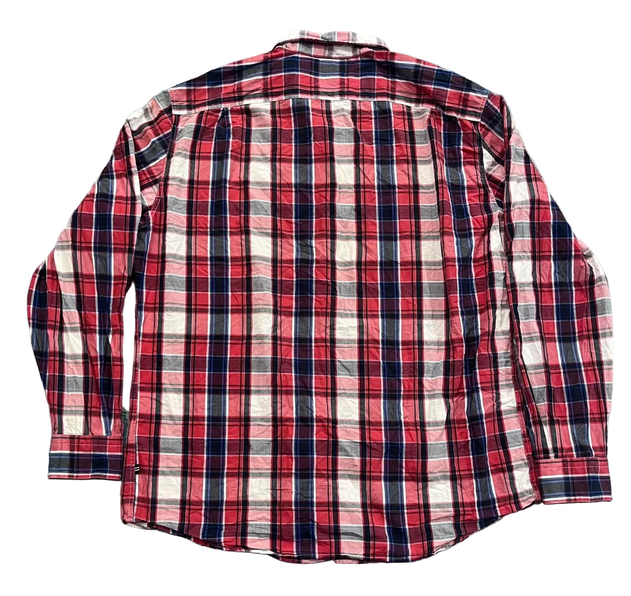 A long-sleeve plaid button-up shirt 
 The shirt features a red, navy blue, white, and gray plaid pattern.
