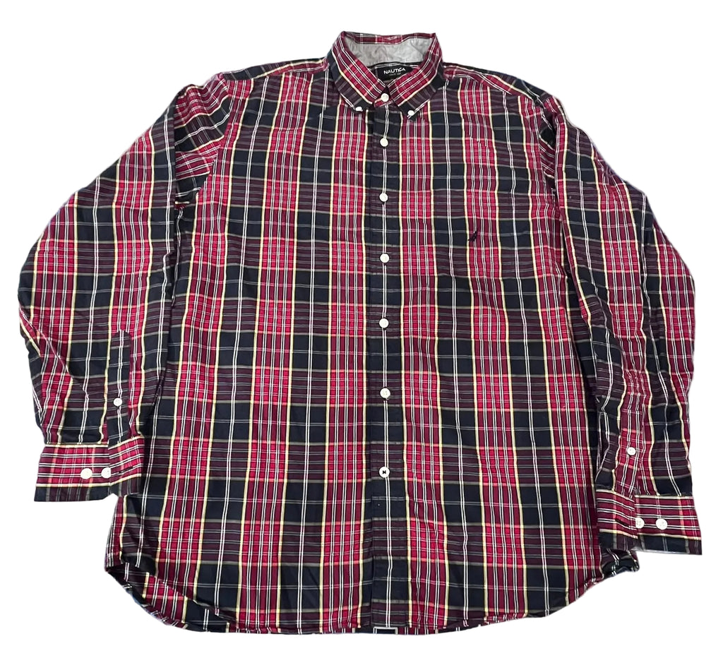 A long-sleeve button-down plaid shirt in red, black, and white
