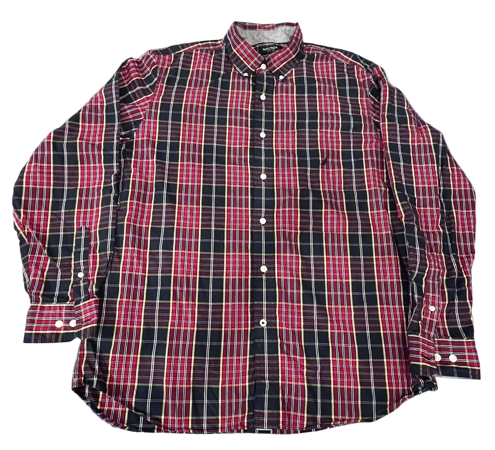 A long-sleeve button-down plaid shirt in red, black, and white