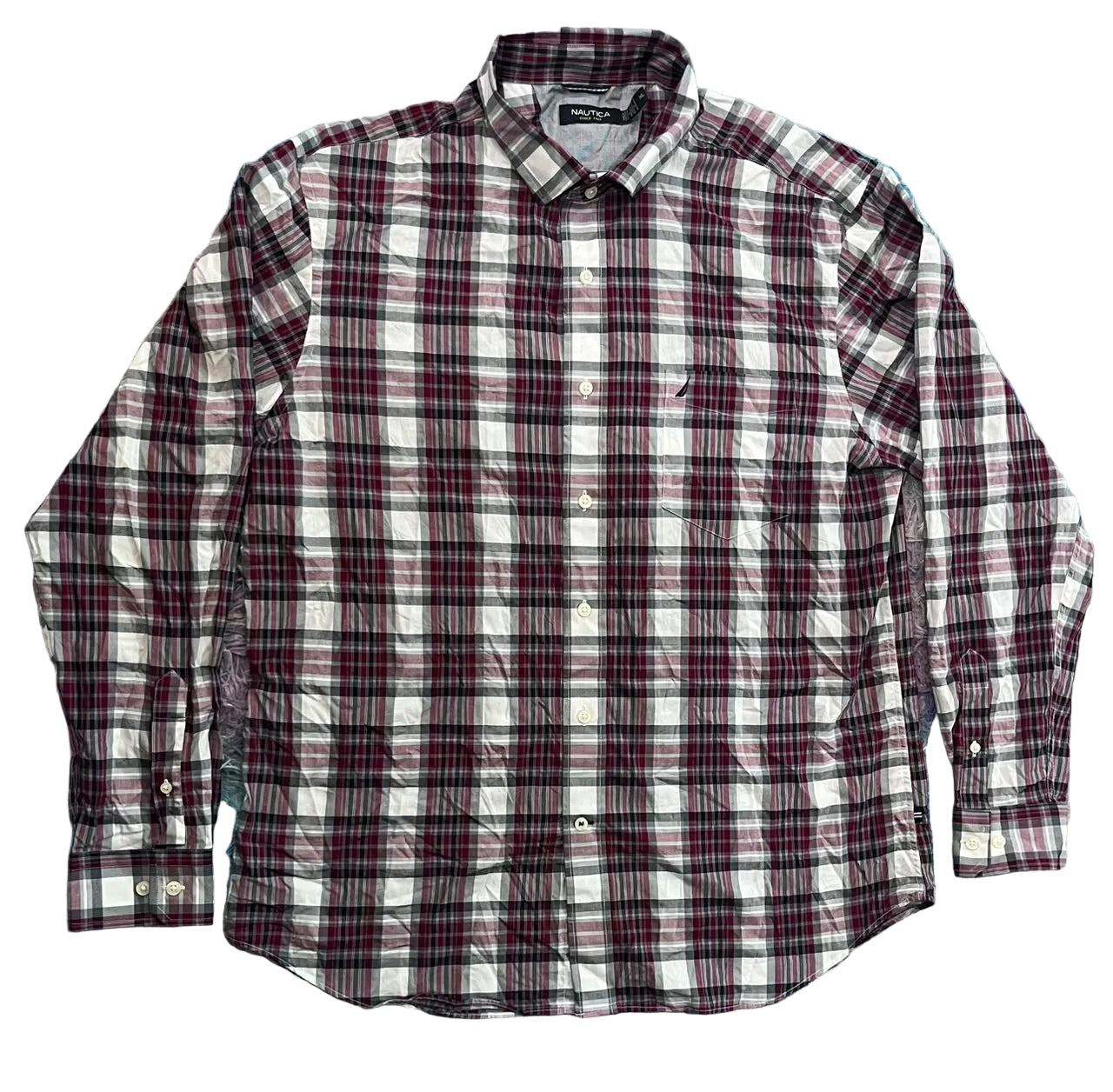 A long-sleeve button-up plaid shirt . The shirt features a white base with a dark red and black plaid pattern.
