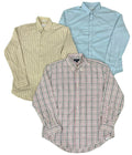 Three men's long-sleeve button-down dress shirts a beige vertically striped shirt, a light blue shirt, and a red-and-white gingham patterned shirt.