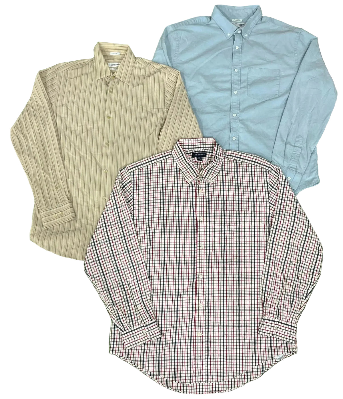 Three men's long-sleeve button-down dress shirts a beige vertically striped shirt, a light blue shirt, and a red-and-white gingham patterned shirt.