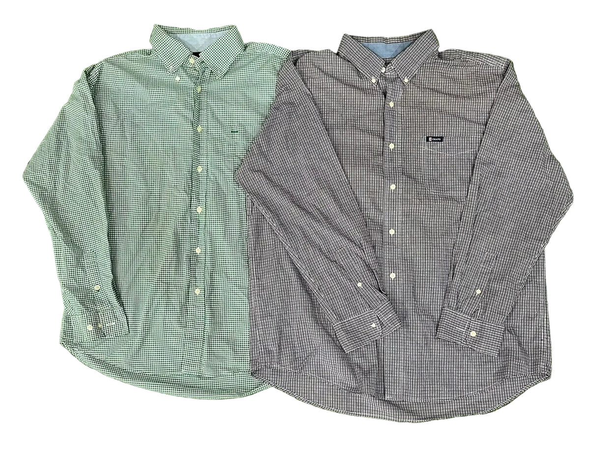 Two long-sleeve button-down shirts The shirt on the left is light green with a fine white check pattern.