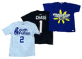 Three graphic t-shirts a light gray shirt with blue 'South Fulton' text and number 2, a black shirt with 'CHASE 1' in white and red, and a royal blue shirt with a yellow sun graphic and 'Paradise Farm Camps' text.