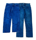 Two pairs of blue denim jeans . The left pair is a medium blue wash with raw, frayed hems, and the right pair is a darker blue wash with a straight leg.