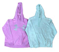Two hooded sweatshirts  a lavender-purple Under Armour hoodie with a large gray logo on the front, and a light mint green Nike hoodie with a small white logo on the chest.