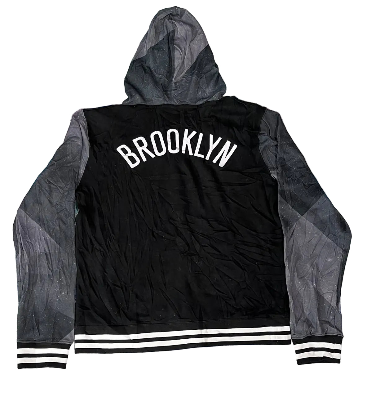 A black and gray hooded varsity jacket with 'BROOKLYN' printed in white across the back,