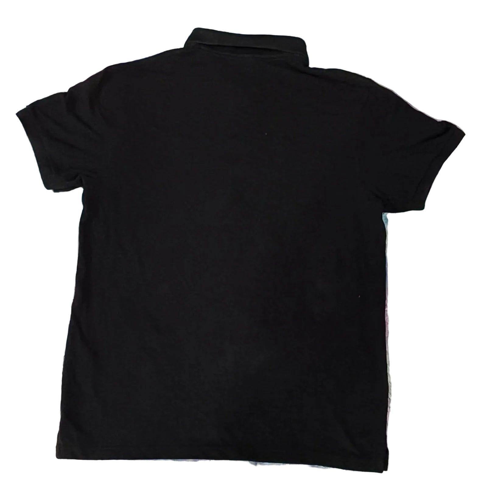 A black short-sleeve polo shirt
