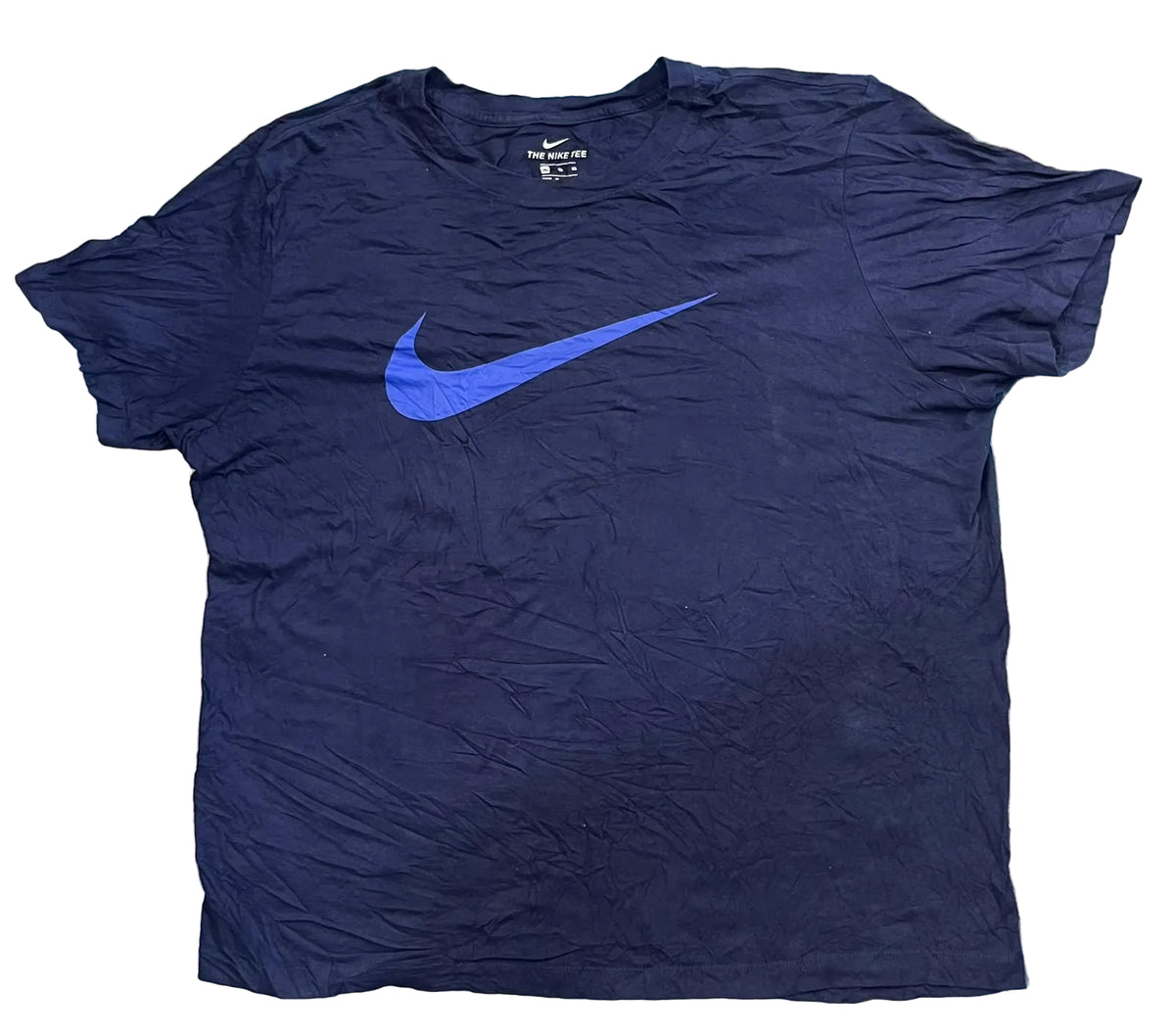 A navy blue Nike short-sleeve t-shirt with a blue Swoosh logo on the chest, 