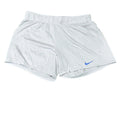 White athletic shorts with a Nike logo on a White background