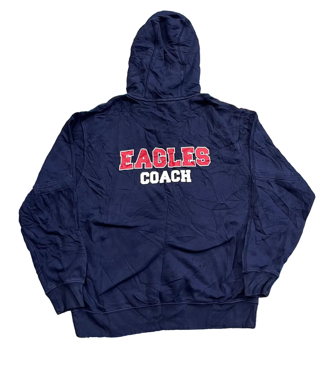 A navy blue hooded sweatshirt The back of the hoodie features the text 'EAGLES COACH' printed in red and white block letters.