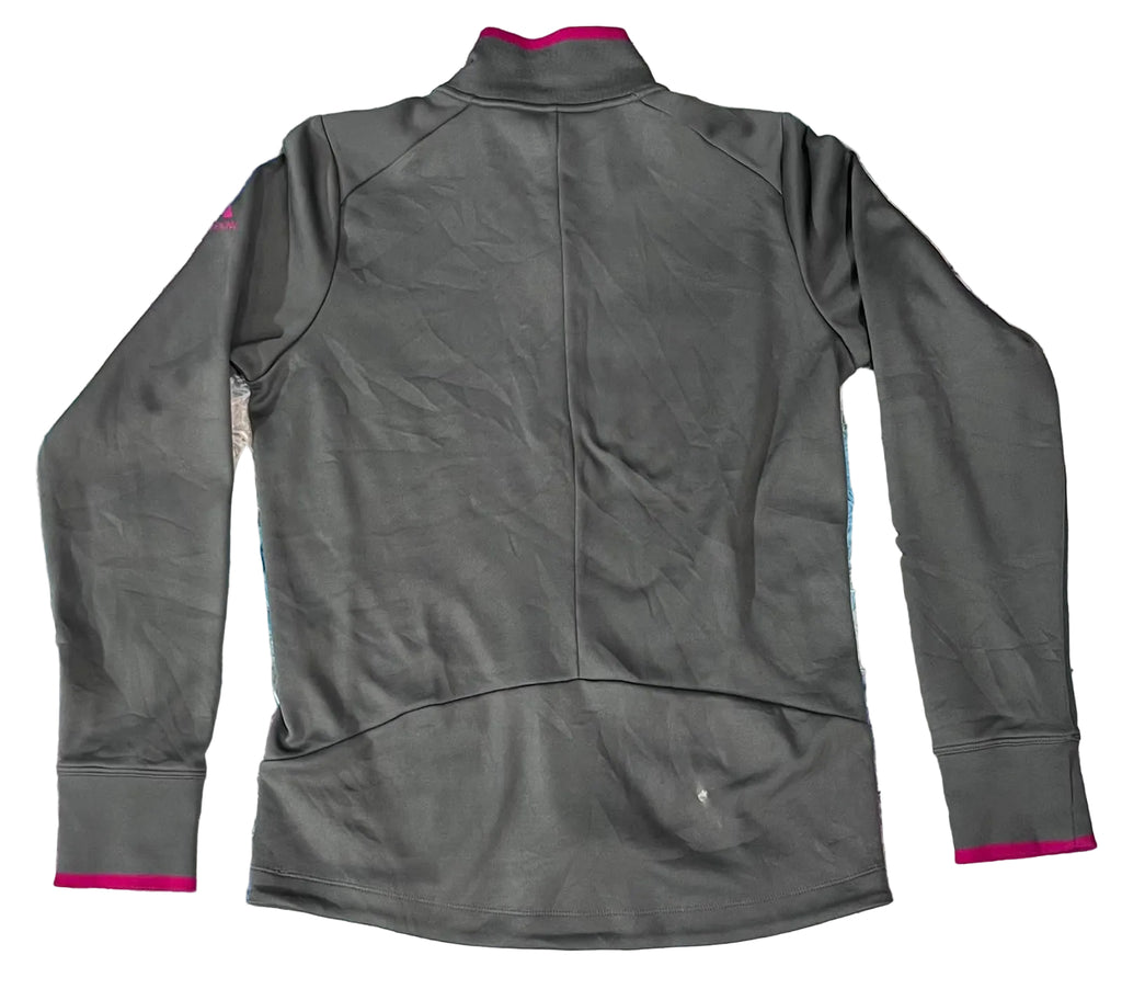 A dark gray long-sleeve athletic top shown from the back The top has a mock neck with bright pink trim, pink trim on the cuffs, and a central seam running down the back.
