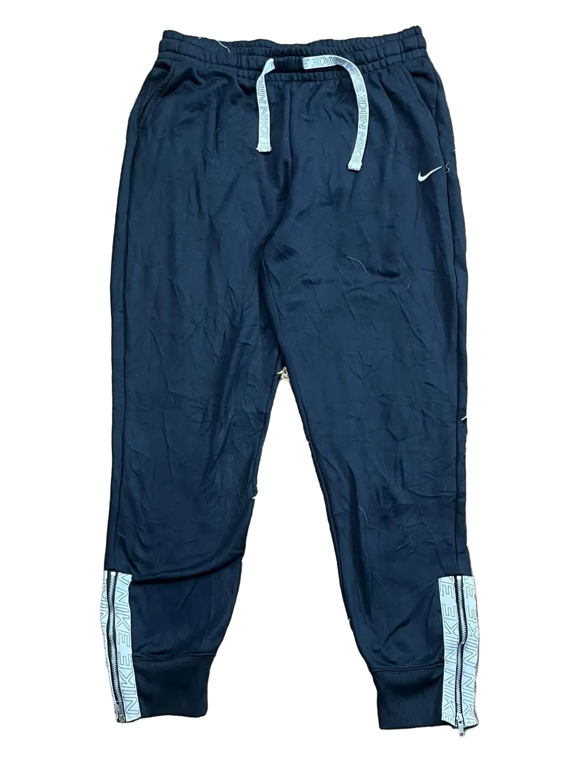 NIKE MEN TROUSER ON THE WHITE BACKGROUND